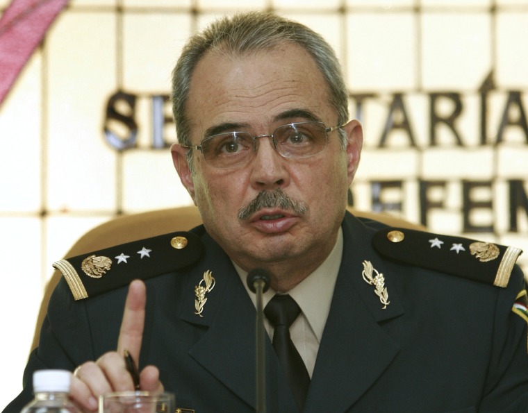 Gen. Carlos Gaytan announces the seizure of 5 1/2 tons of cocaine at a press conference Tuesday, in Mexico City.