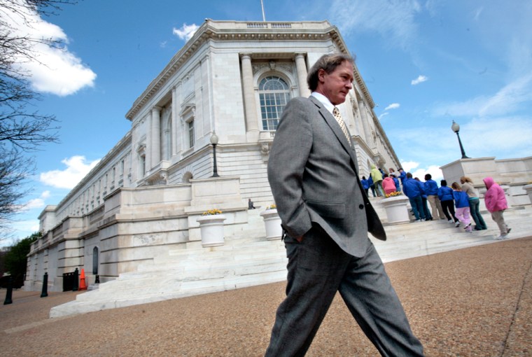 Sen. Lincoln Chafee (R-R.I.) walks by the Russell Senate Office Building in Washington, D.C.