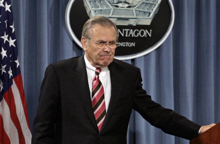 US Secretary of Defense Rumsfeld leaves after news briefing at Pentagon