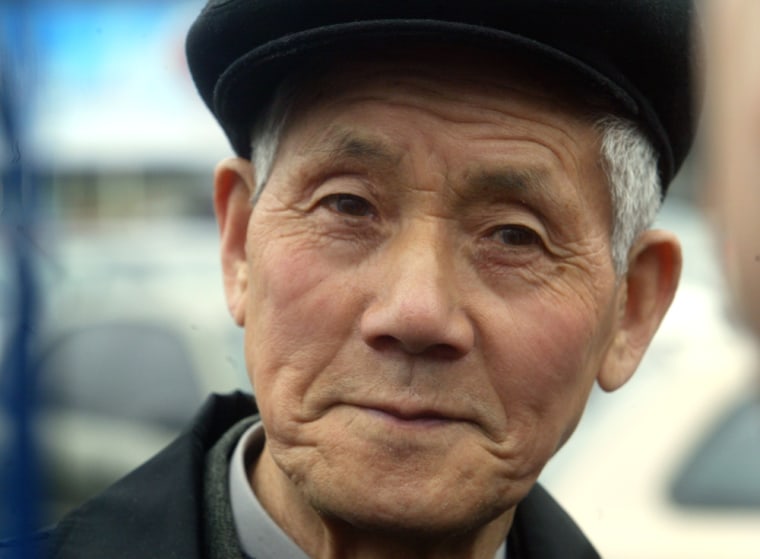 Ishinosuke Uwano, 83, a former Japanese soldier who had been declared among Japan's war dead in 2000, appeared Tuesday at Kiev's Boryspil airport, Ukraine, before his flight to Japan. 
