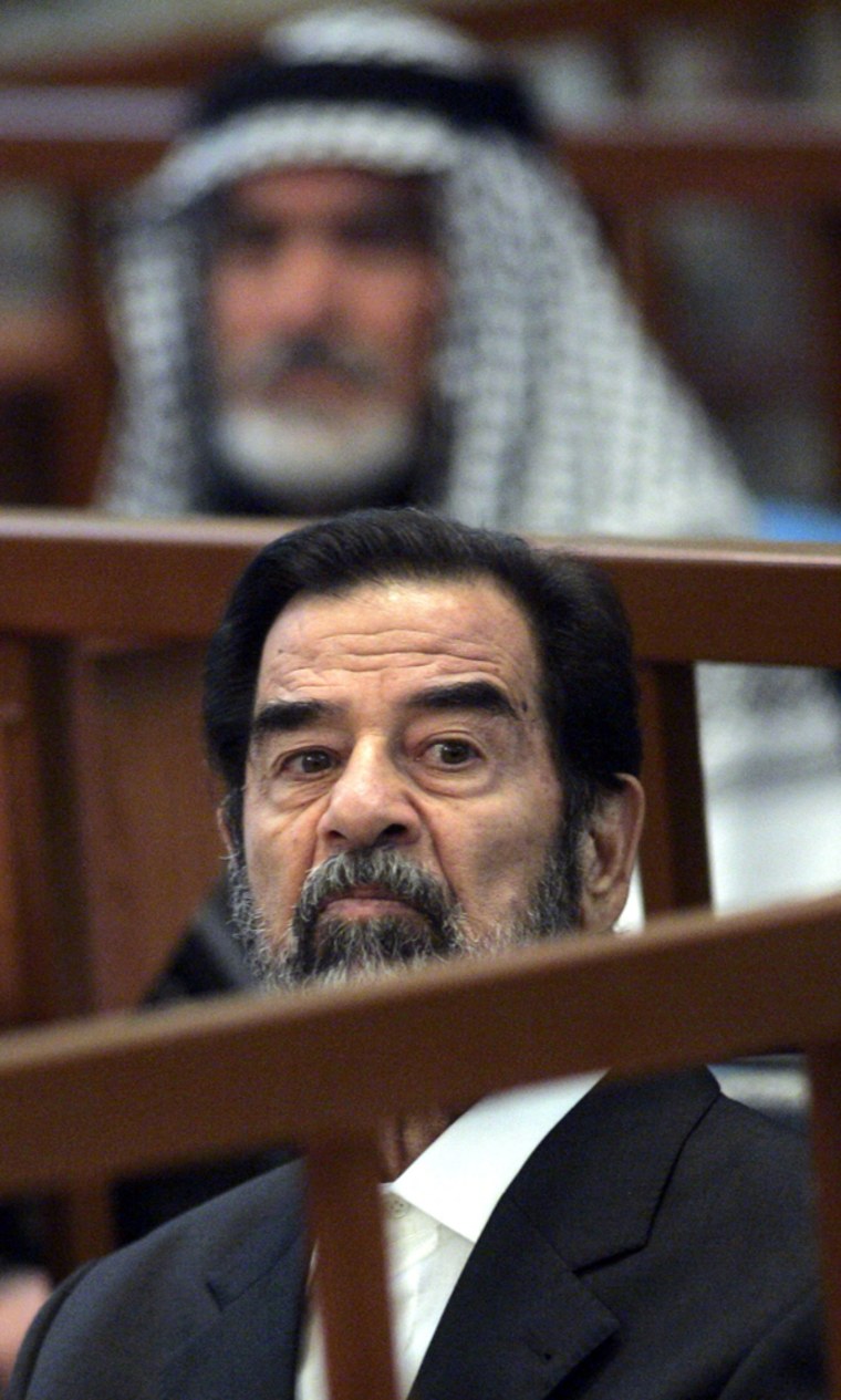 Former Iraqi President Saddam Hussein li