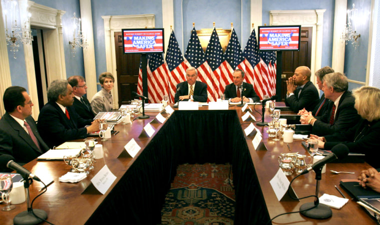 Boston Mayor Thomas Menino, center left, and New York Mayor Michael Bloomberg, center right, lead a group of mayors from around the country for the first National Summit on Illegal Guns in New York on Tuesday.