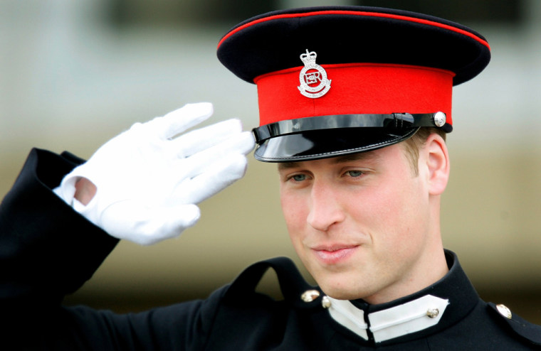 Britain's Prince William salutes after the Sovereign's Parade at the Royal Military Academy in Sandhurst