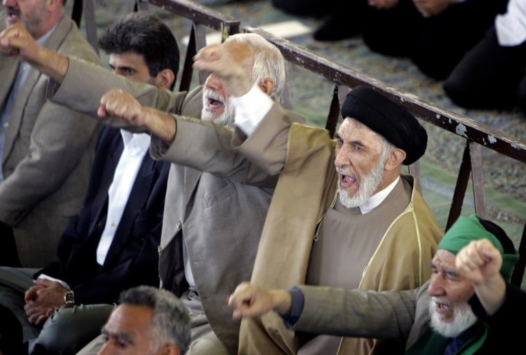 Iranian worshippers chant slogans in support of Iran's nuclear programme during Friday prayers ceremonies in Tehran