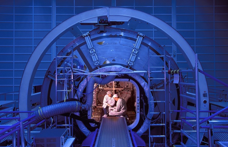 Undated hand-out picture shows technicians working in the Columbus space laboratory at EADS in Bremen