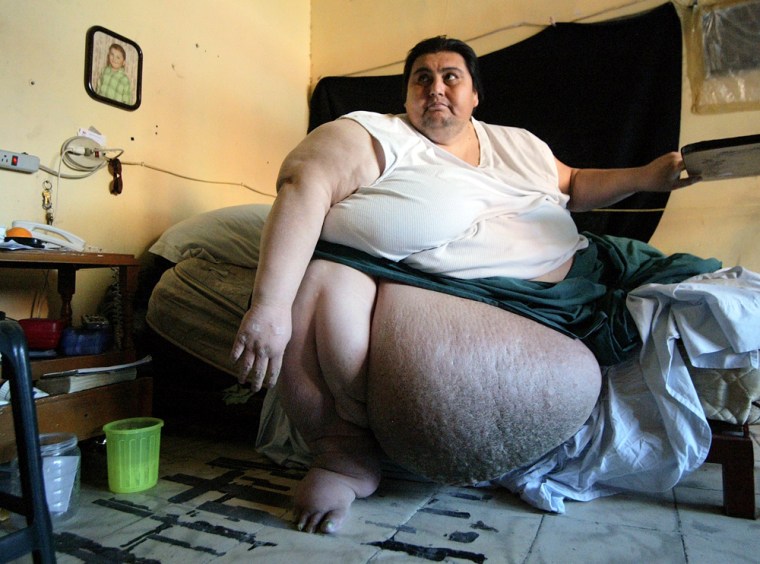 File photo of Mexican 550kg Manuel Uribe sitting on his bed at home in Monterrey