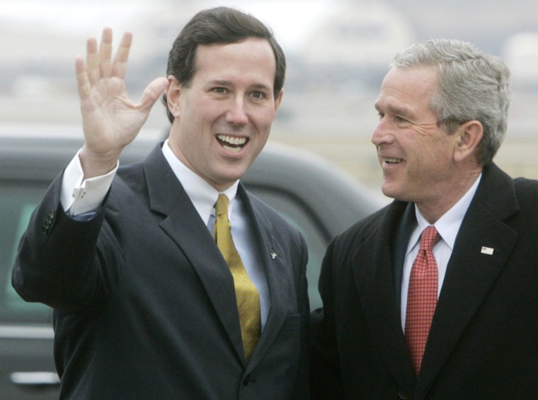 US President George W Bush is met  by US Senator Rick Santorum in  Pittsburgh
