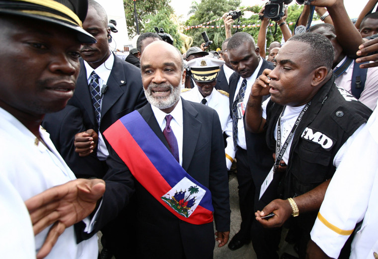 Haiti's new president Rene Preval shakes