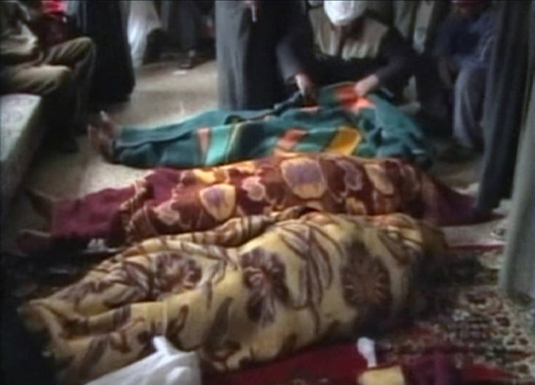 A video provided to Reuters by Hamourabi Human rights group shows covered bodies in Haditha