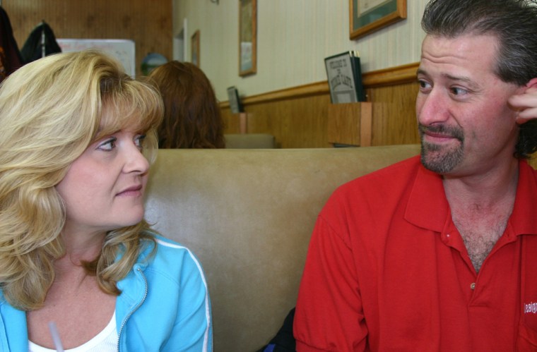 Shannen Rossmiller and her husband Randy seen here at a cafe in their hometown in Montana. She is a volunteer online cybersleuth who tracks would-be terrorists and turns their names over to U.S. intelligence agencies, while he keeps the eight computers in their house up and running.