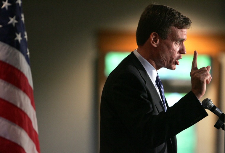 Former Virginia Governor Warner gestures while speaking at the New Hampshire Democratic Party Convention in Goffstown, New Hampshire