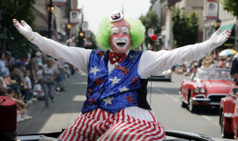 Harpo the Clown waves to spectators during a parade for late comic Red Skelton in Vincennes, Ind., on Saturday. The weekend-long celebration kicked off a multimillion-dollar fundraising campaign to build a Red Skelton museum. 