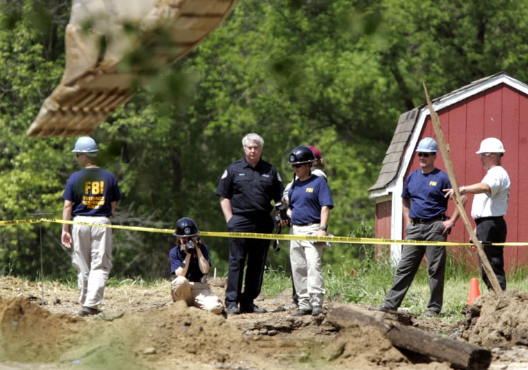 FBI Evidence Response Team directs digging of hole during search of horse farm for Hoffa's remains in Milford