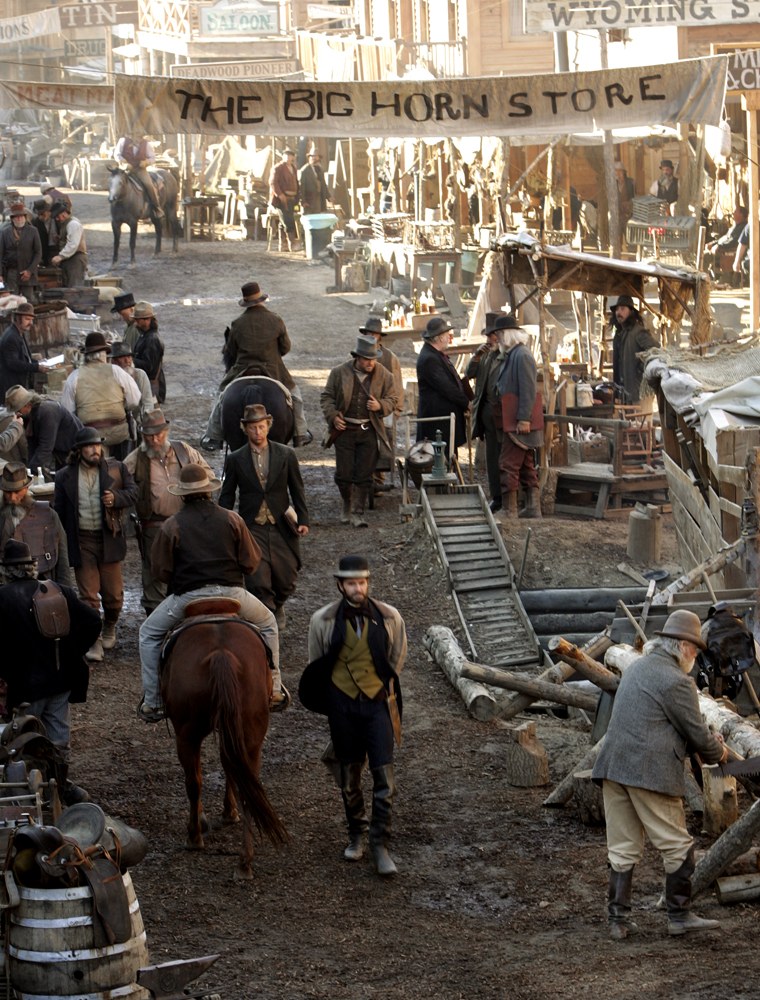 Actors and stand-ins move about on the main street set of HBO's popular \"Deadwood\" series during filming Wednesday, Feb. 9, 2005, in Santa Clarita, Calif. (AP Photo/Kevork Djansezian)