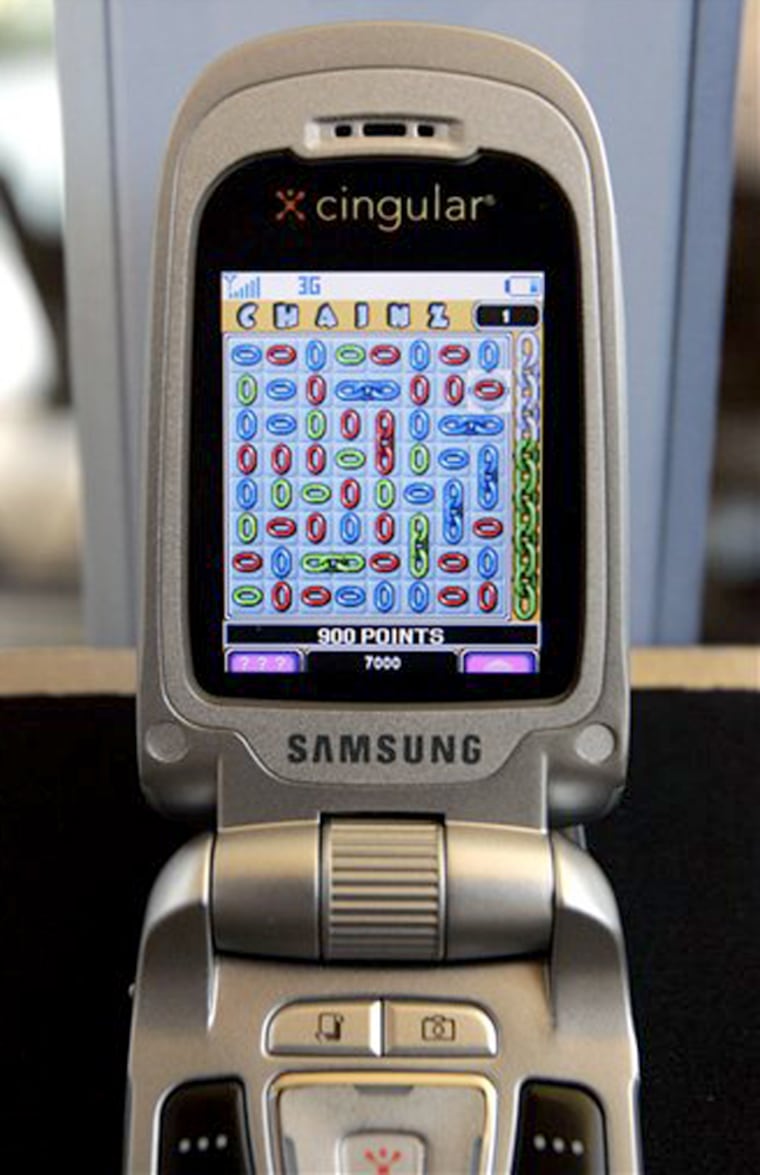 A game of "Chainz" is shown on the display of a cell phone at a Real Networks display at Casuality, a conference for casual game developers. 