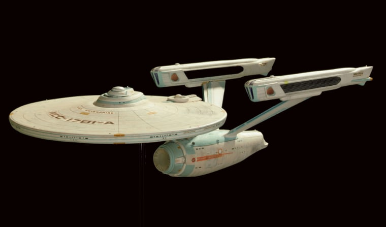 In this photo released by Christies Images Ltd.2006, on Thursday, May 18, 2006 in New York, a model of the Starship Enterprise-A, is shown. The model, made from a modified plastic hobby kit, was used in visual effects production for 1991 feature film: Star Trek VI: The Undiscovered Country and in earlier Star Trek movies.  The model will join other memorabilia from the Star Trek television series and feature films that will go up on the block at Christies on October 6 and 7. Prior to the auction the collection will tour the U.S. and Europe.  (AP Photo/Christies Images Ltd.2006)  **NO SALES**
