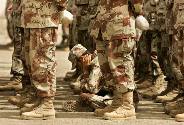 A soldier from the first entirely Sunni basic training class sits during a graduation ceremony in Habaniyah, Iraq, in April.
