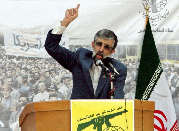 Iranian parliament speaker Gholam Ali Haddad Adel, delivers his speech during an anti-Israeli demonstration at the Palestine Sq. in Tehran, Iran, Tuesday, July 18, 2006. Speaking to a crowd of thousands of anti-Israel demonstrators Adel told Israelis: \"The towns you have built in northern Palestine (Israel) are within the range of the brave Lebanese children. No part of Israel will be safe.\" A poster of Hezbollah leader Sheik Hassan Nasrallah is seen at right. (AP Photo/Vahid Salemi)