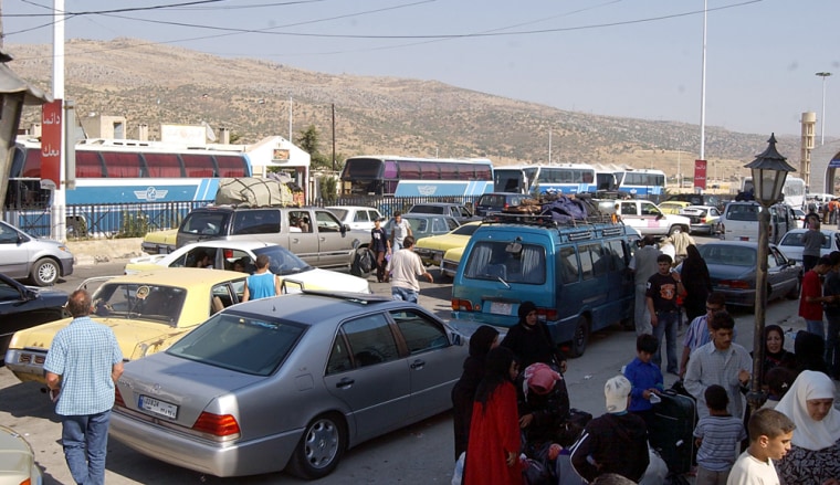 Jdaydet Yabous border crossing at the Syrian-Lebanese border 35 miles west of Damascus was choked with cars leaving Lebanon last Saturday. 