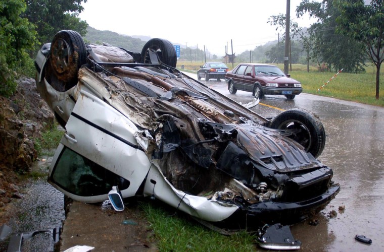 A car over turned on a slippery road in