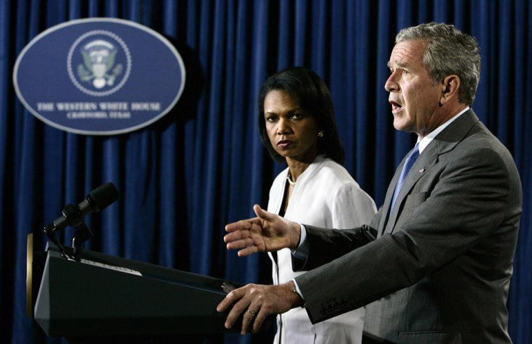 U.S. President Bush speaks alongside Secretary of State Rice in Crawford