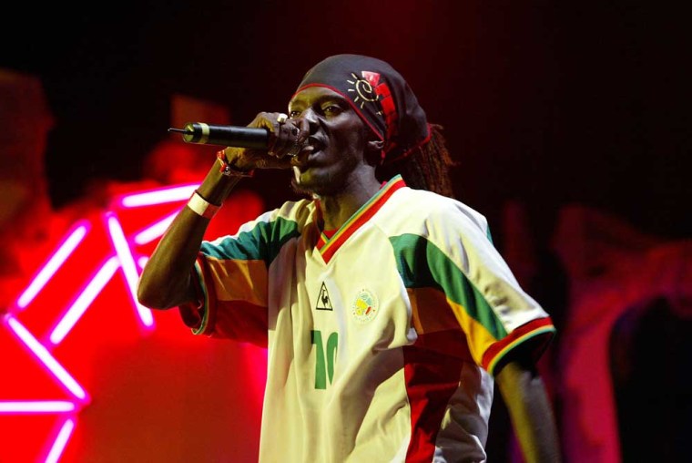 A singer from Senegal's hip-hop group Positive Black Soul performs in Dakar. Senegalese rappers are among the country's loudest campaigners for social justice, and their voices are only going to get louder in the run-up to the 2007 elections. 