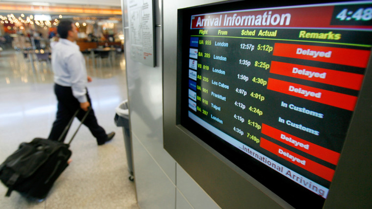 Incoming international flights are displayed on a monitor at San Francisco International Airport on Thursday.