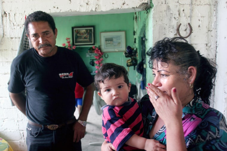 Parents of Mexican fisherman Lucio Rendon return home in El Limon