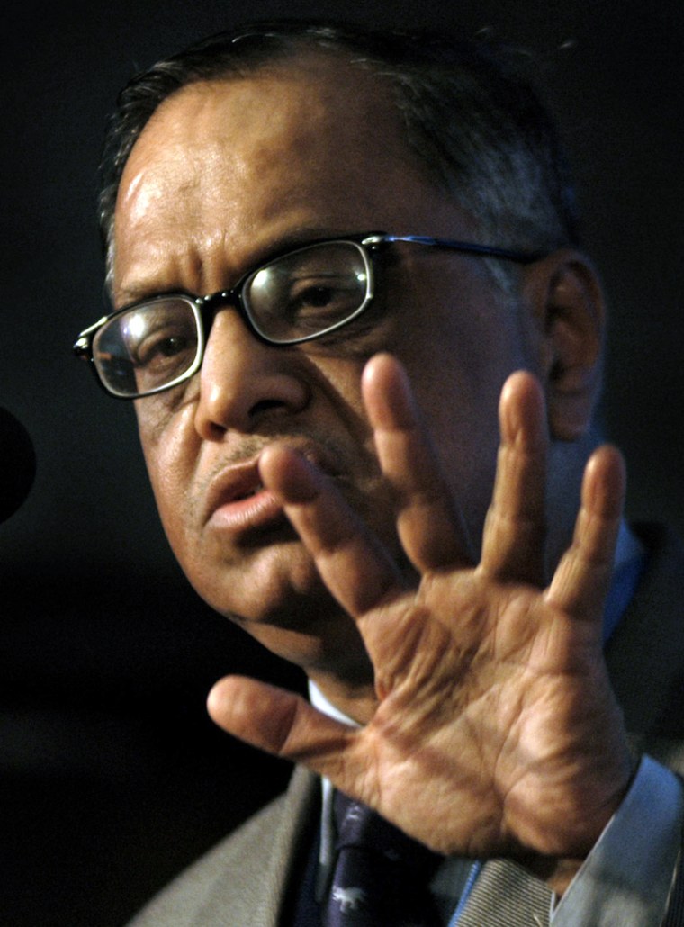 Chairman of Infosys Murthy reacts during news conference in Bangalore