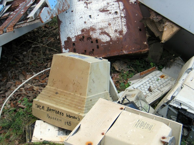 Computer equipment and other items from the YMCA Battered Women's program in New Orleans lie in a heap cleanup efforts from Hurricane Katrina's aftermath continue.