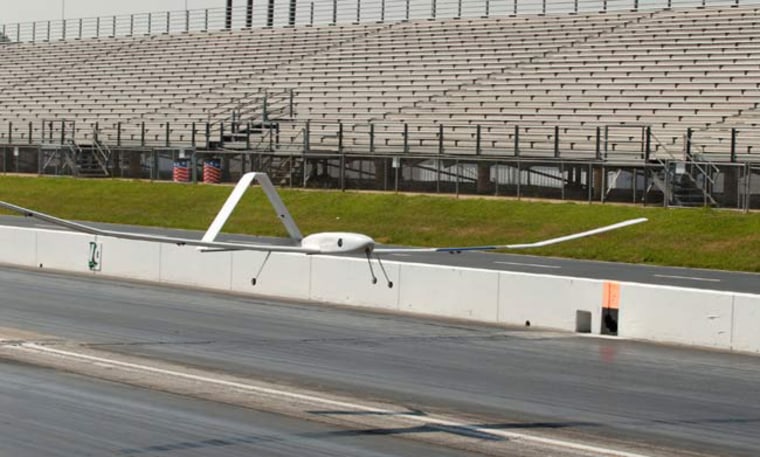 Georgia Tech's fuel cell aircraft flies above the track at the Atlanta Dragway in Commerce, Ga. The unmanned vehicle flew for up to a minute at a time during the test flights.
