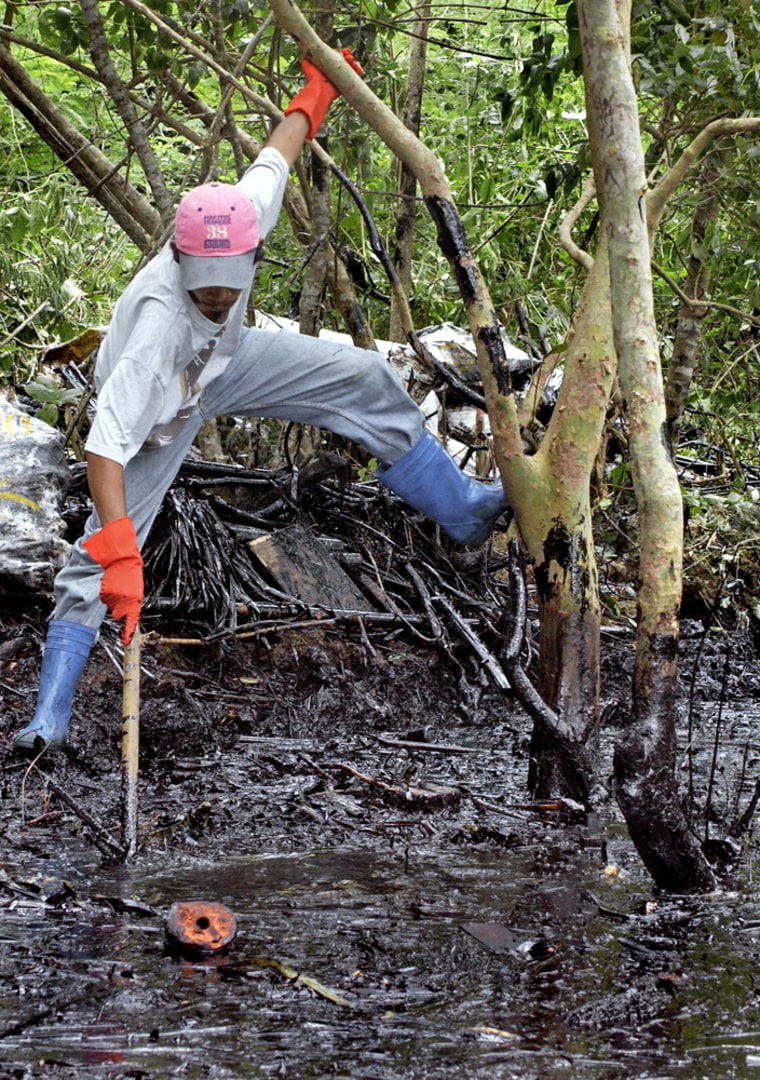 A resident takes part in the cleaning of