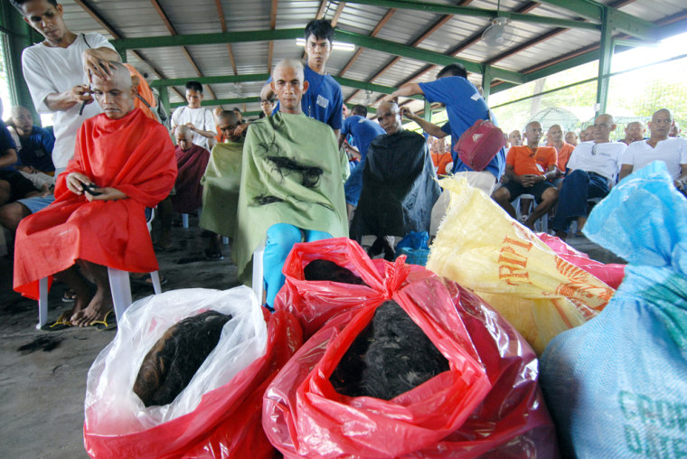 Bags of hair are collected in plastic ba