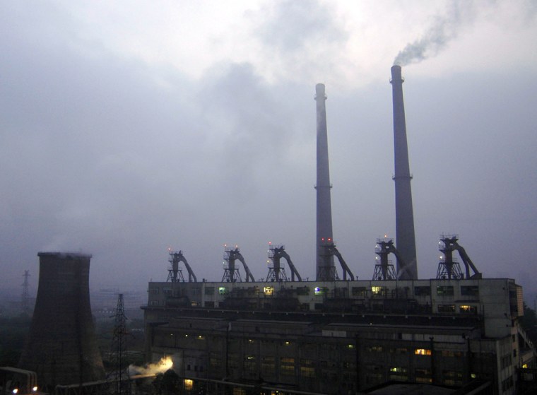 A view of a coal-burning power plant during daybreak in Xiangfan