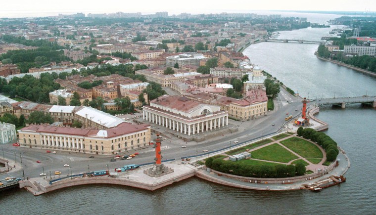An aerial view of downtown St. Petersburg shown with city landmarks, the Spit of Vasilyevsky Island and the Neva River. With its orderly planning, understated grandeur and rich contribution to European culture, St. Petersburg, Russia's former imperial capital and President Vladimir Putin's hometown, is not a typical Russian city.