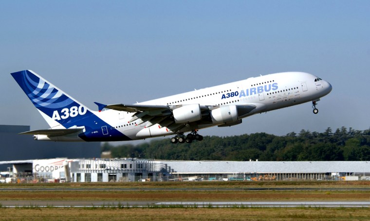 An Airbus A380 double-decker superjumbo takes off  for the first long-distance test flight with hundreds of passengers on board in Toulouse