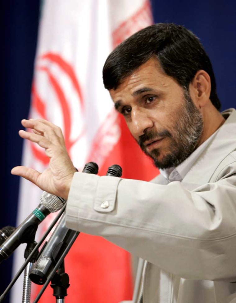 Iran's President Mahmoud Ahmadinejad meets with Iranian students and scientists in Tehran on Tuesday, where he called for the removal of liberal and secular teachers in the country's universities.