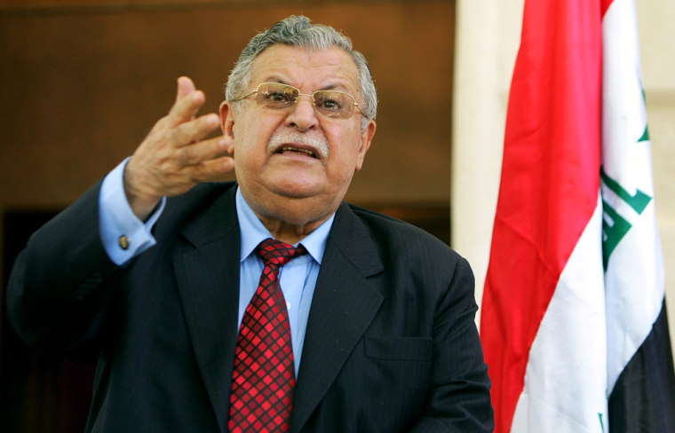 Iraqi President Talabani speaks during meeting with British Foreign Secretary Beckett in Baghdad