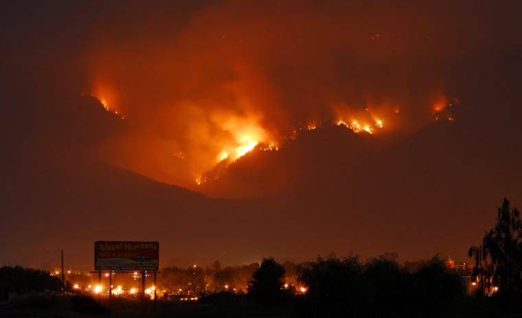 The 180,000-acre fire near Big Timber, Mont., is not the only one troubling the state. The fire seen here was raging Tuesday night outside the town of St. Ignatius on the Confederated Salish and Kootenai Indian Reservation in western Montana.