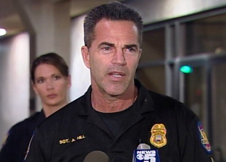 Sgt. Andy Hill, a spokesman with the Phoenix Police Department, announces the arrest of a man allegedly connected to the investigation of the "Baseline Killer."