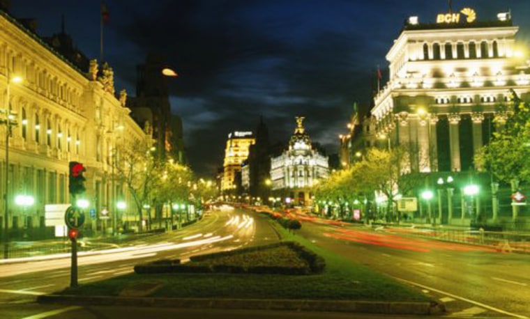 Madrid, Spain: Plaza de Cibeles, traffic at night