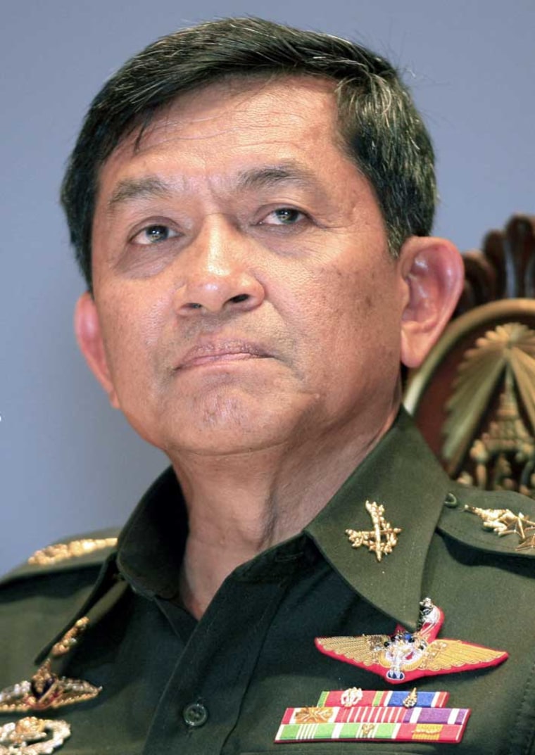 Thailand's army chief, Gen. Sonthi Boonyaratglin, answers questions at a news conference in Bangkok on Wednesday.