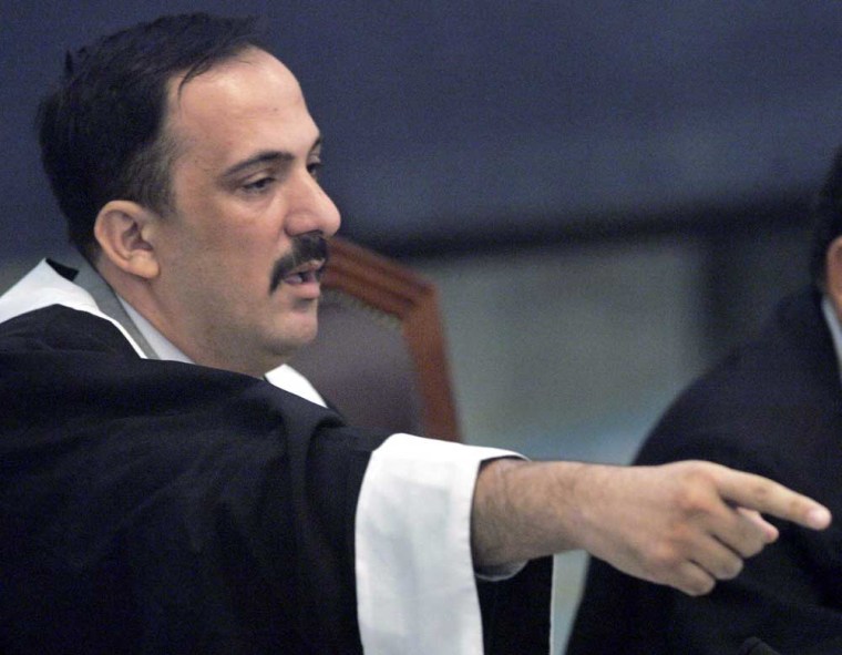 New chief judge Mohammed al-Uraibiy,  a Shiite Muslim Arab, presides over Saddam Hussein's trial on Wednesday.