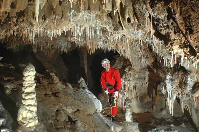 A researcher explores part of the new cave system discovered at Sequoia and Kings Canyon National Park in California. 