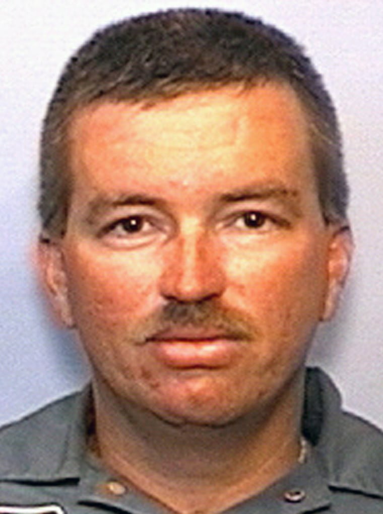 Polk County Deputy Matt Williams is seen in this undated handout photo released September 28, 2006. A massive manhunt was under way in central Florida on Thursday for a man who killed Williams and wounded another police officer after a traffic stop. A police dog working with the slain officer was also killed, Polk County Sheriff Grady Judd told reporters.