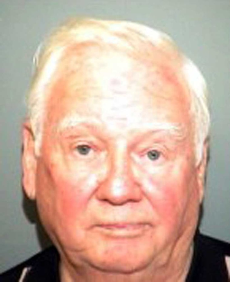 Monsignor John Skehan is seen after his arrest Wednesday night at the Palm Beach International Airport. He returned home from Ireland on charges that he stole $8.6 million from the church where he has been pastor for four decades. 