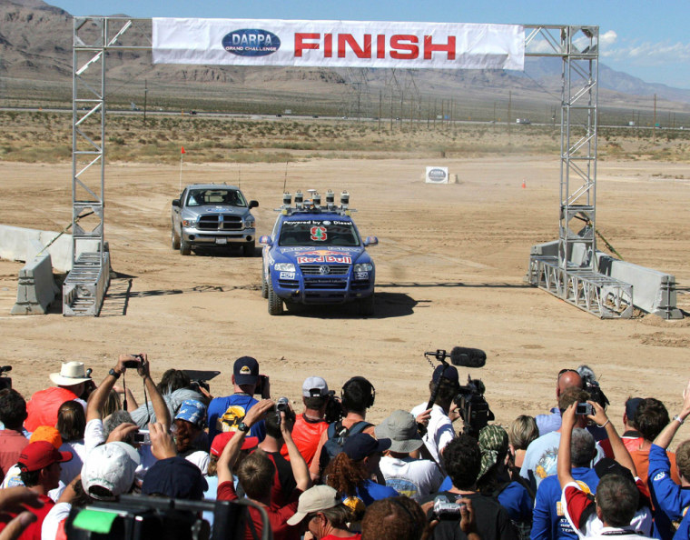 Stanford University Racing team crosses DARPA 2005 Challenge Race finish line in Primm