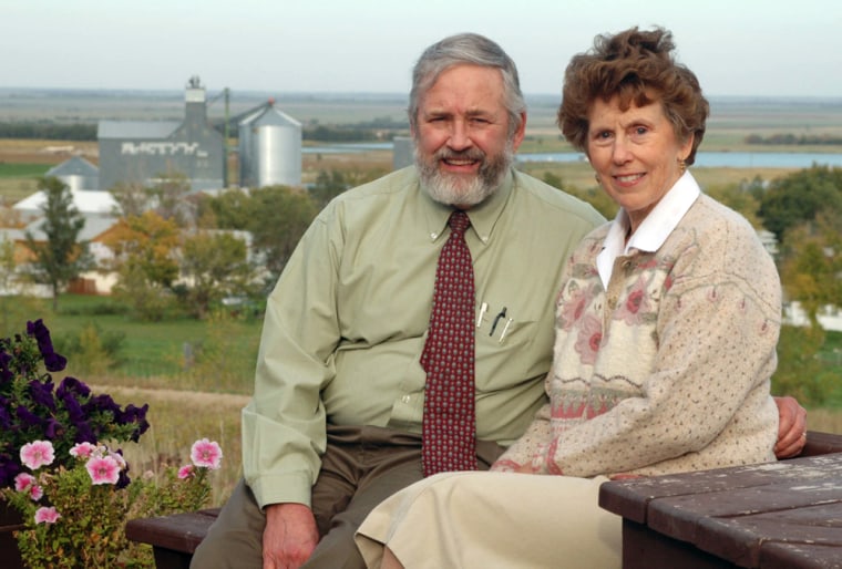 ** ADVANCE FOR MONDAY, OCT. 9 **Dr. Tom Dean and his wife, Kathy, who both serve on the board of the group opposing a statewide ban on abortions in South Dakota, pose on the deck of their home overlooking the town of Wessington Springs, S.D., Oct. 5, 2006. (AP Photo/Doug Dreyer) ADVANCE FOR MONDAY