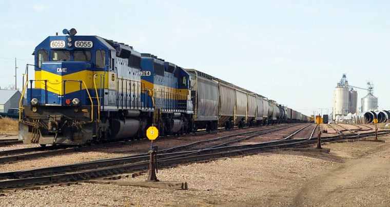 A Dakota, Minnesota & Eastern Railroad train sits near Huron S.D. The DM&E wants to upgrade its 600-mile line through Minnesota, South Dakota and Wyoming and add 260 miles of new track to Wyoming's Powder River Basin so it can transport coal to power plants to the east, using several dozen trains a day.