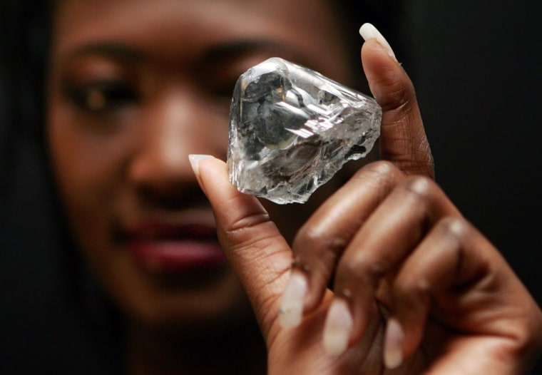 Model displays rare 603 carat white diamond in Antwerp